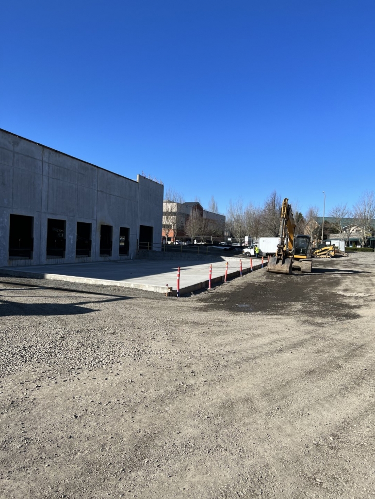 Commercial drainage site preperation including sidewalks and water lines in Portland