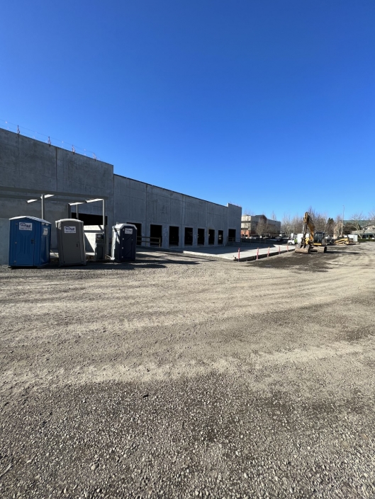 Commercial drainage site preperation including sidewalks and water lines in Portland