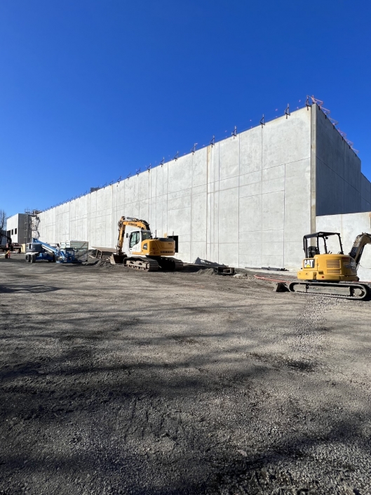 Commercial drainage site preperation including sidewalks and water lines in Portland